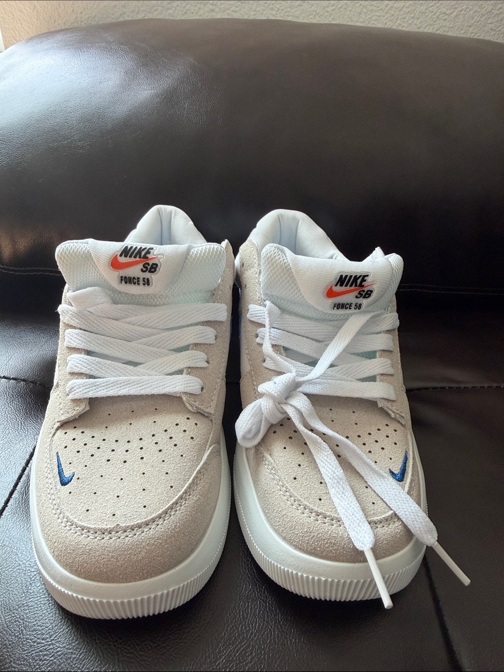 Nike Beige and White Skate Sneakers with Small Blue Swoosh